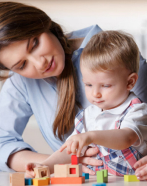 A bilingual nanny teaches a child in another language.